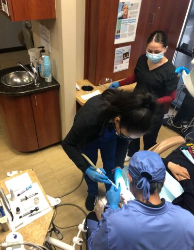 Students doing dental work under supervision in Sugar Land, TX